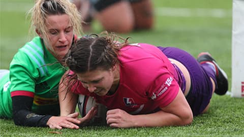 two rugby players on the pitch